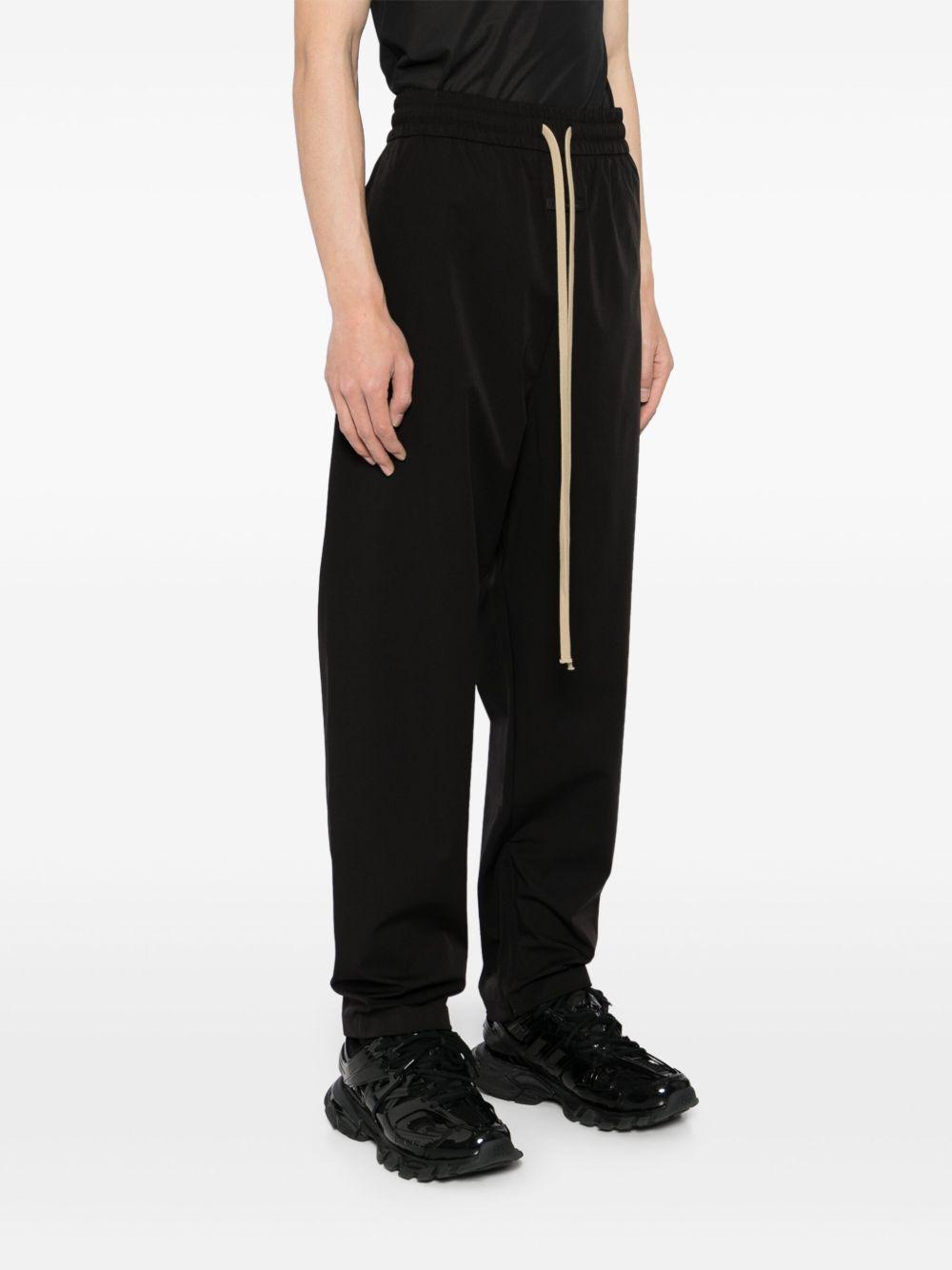 Nylon track trousers FGE240 404PONBLACK FEAR OF GOD 