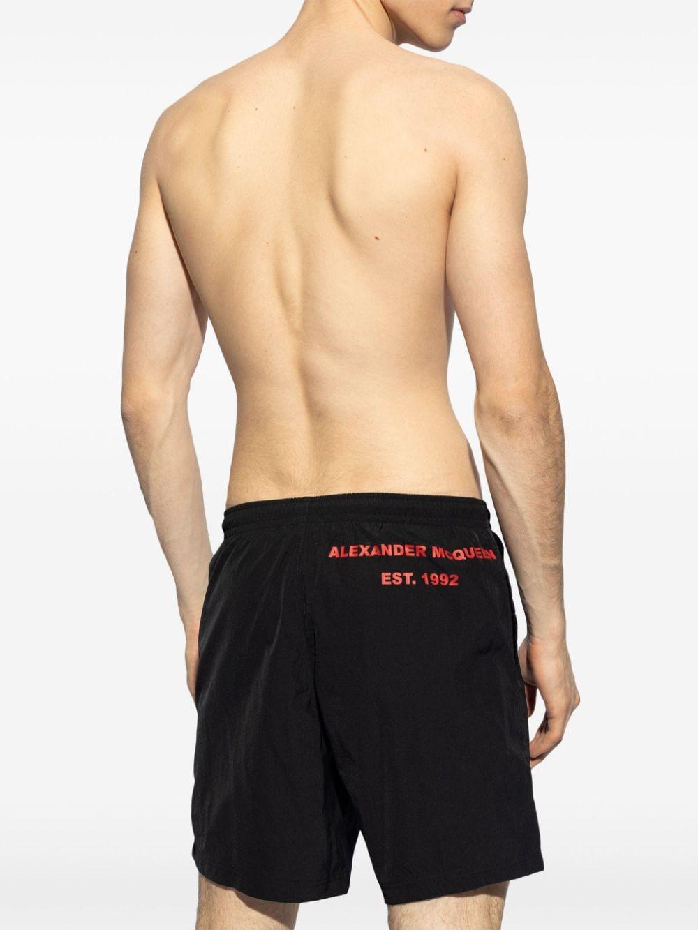 Logo-print swim shorts 660060 4419Q1074 ALEXANDER MCQUEEN 