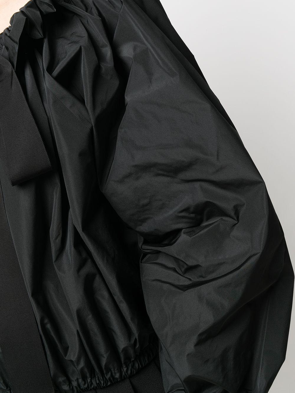 Black ruffle-trimmed blouse TO0170011 999B PATOU 